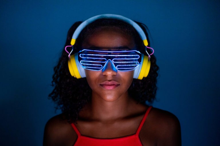 a person wearing blue and yellow goggles