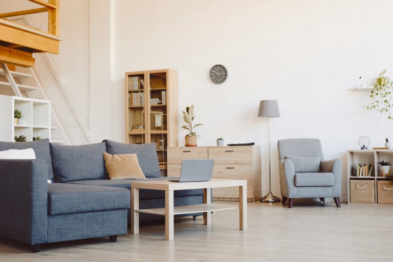 a living room with a couch and a table